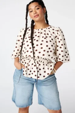 Getailleerde blouse met polka dot