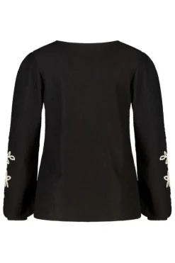 Top met borduursel