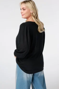 Top met pofmouwen