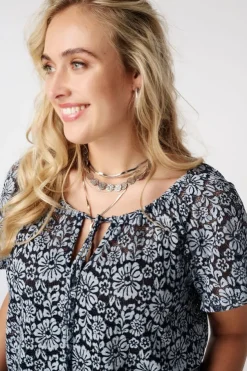 Top van kant met bloemenprint